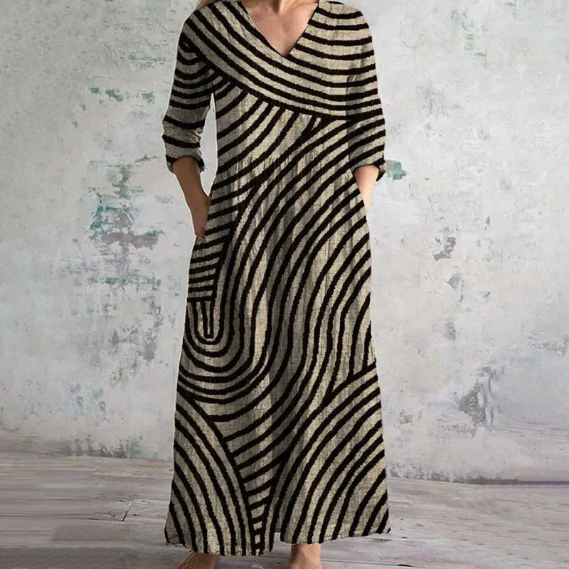 "Kyla | Rochie Maxi Vintage cu Dungi" can be rewritten as "Rochie Maxi Vintage cu Dungi Kyla".